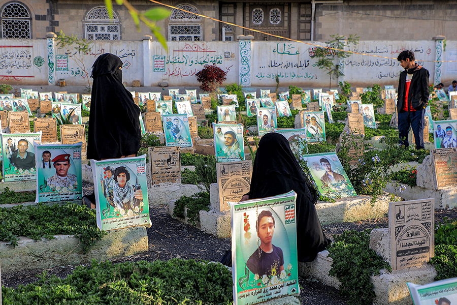 Women visit the graves of people reportedly killed during the war in Yemen at a cemetery in Sanaa during the Muslim holy month of Ramadan in April. Saudi Arabia, a major U.S. arms client, has been fighting the Houthis in Yemen since 2015. The war has killed thousands of people and sparked the world's worst humanitarian crisis. (Photo by Mohammed Huwais/AFP via Getty Images)