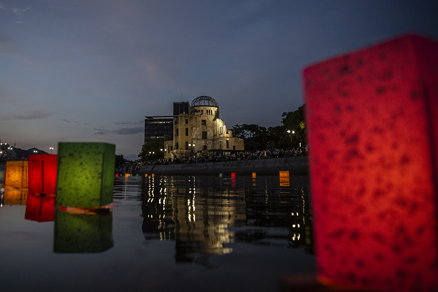Paper lanterns float on the Motoyasu River as The Atomic Bomb Dome looms in the background at the peace park in Hiroshima, Japan, which commemorates the first use of a nuclear weapon in armed conflict. Some 90,000 to 146,000 people were killed in the 1945 bombing and the entire city was destroyed. G-7 leaders will meet in Hiroshima this month. (Photo by Yuichi Yamazaki/Getty Images)