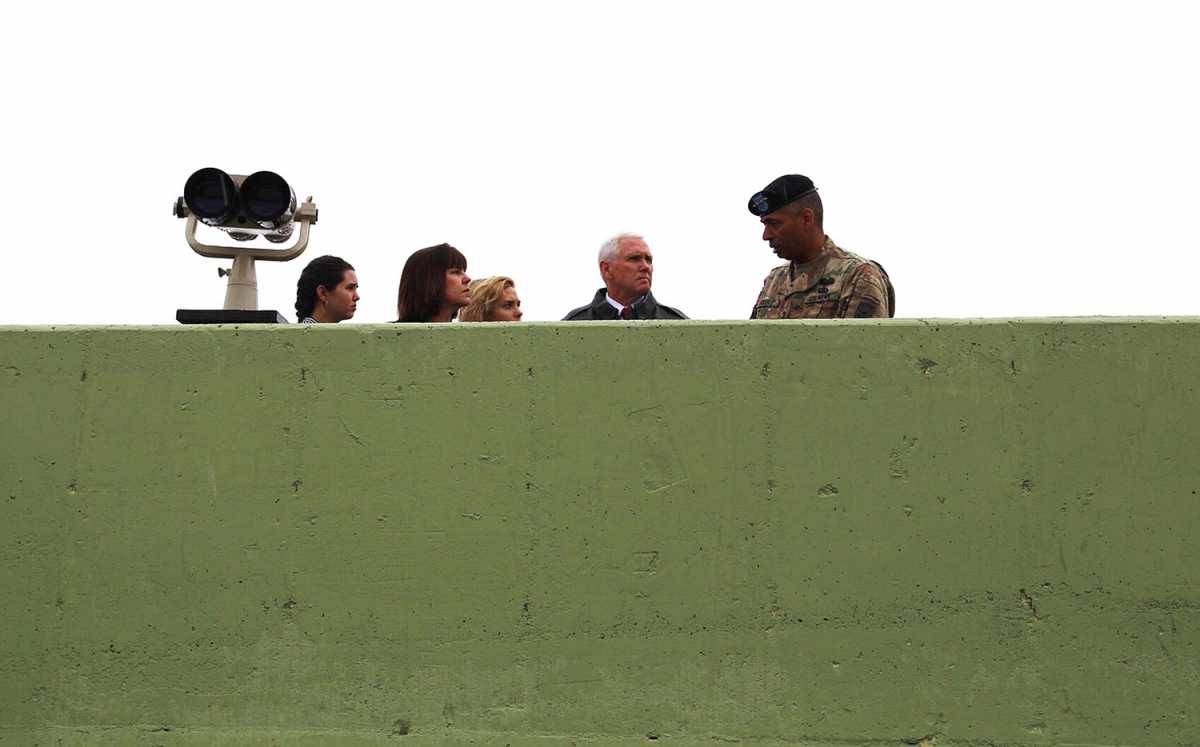 U.S. Army General Vincent K. Brooks, commander of United Nations Command, Combined Forces Command and U.S. Forces Korea, talks with U.S. Vice President Mike Pence and his family near the Demilitarized Zone, April 17. Credit: U.S. Army photo by Sgt. 1st Class Sean K. Harp