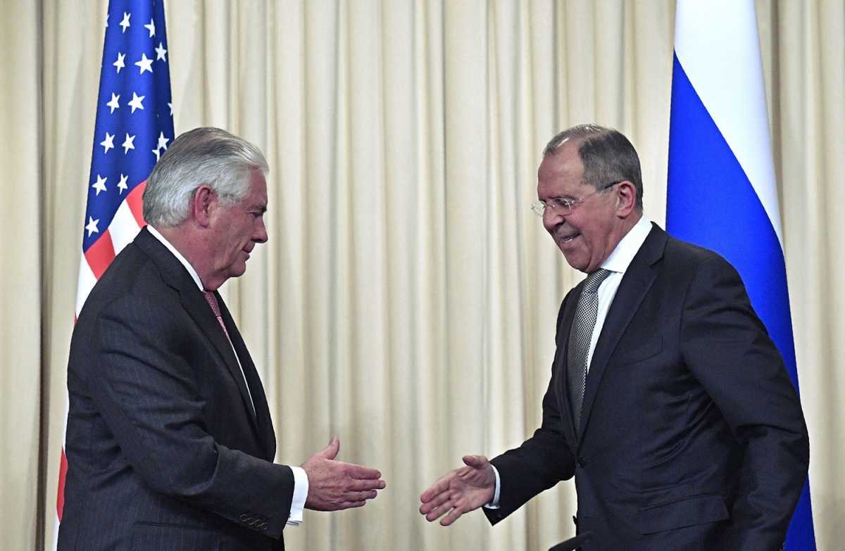 Rex Tillerson, on his first visit to Moscow as U.S. Secretary of State, shakes hands with Russian Foreign Minister Sergey Lavrov after a press conference April 12. Credit: Alexander Nemenov/AFP/Getty Images