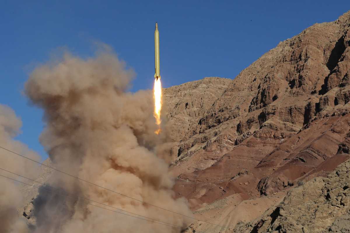 A medium-range Qadr ballistic missile is launched in the Alborz mountain range in northern Iran on March 9, 2016. The United States says the test is contrary to UN Security Council Resolution 2231, which calls on Iran not to develop or test ballistic missiles that are “designed to be nuclear capable.” Credit: Mahmood HosseinI/AFP/Getty Images