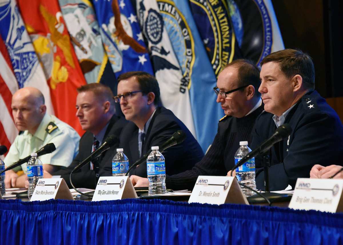 The author (center) on a panel at a Combating Weapons of Mass Destruction Global Synchronization Conference last year. The conference, hosted by the Defense Threat Reduction Agency/U.S. Strategic Command Center for Combating Weapons of Mass Destruction, brings together hundreds of experts and senior officials from the military services, the Pentagon, the State Department, other U.S. government agencies, and allied nations to coordinate U.S.-led efforts to combat weapons of mass destruction around the world. Credit:  Defense Threat Reduction Agency
