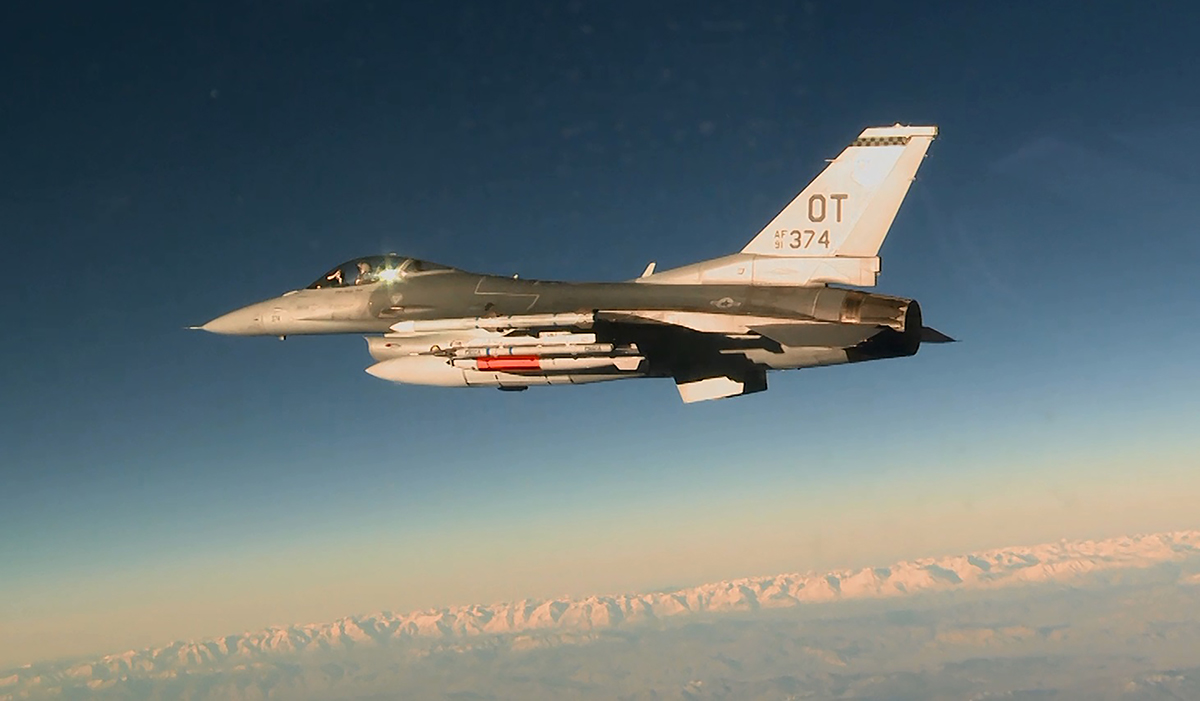 An Air Force F-16C prepares to drop an inert B61-12 during a development flight test by the 422nd Flight Test and Evaluation Squadron at Nellis Air Force Base, Nevada, on March 14, 2017. The test is part of the life extension program intended to improve the weapon’s safety, security and reliability. (Photo credit: Staff Sgt. Brandi Hansen/U.S. Air Force)