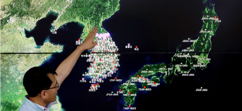 Ryoo Yog-Gyu, a Monotoring director of National Earthquake and Volcano Center, shows seismic waves taking place in North Korea on a screen at the Korea Meteorological Administration center on September 3, 2017 in Seoul, South Korea. South Korea, Japan and the U.S. detected an artificial earthquake from Kilju in the northern Hamgyong Province of North Korea. The Japanese government has confirmed they believe it was North Korea's sixth nuclear test. (Photo by Chung Sung-Jun/Getty Images)