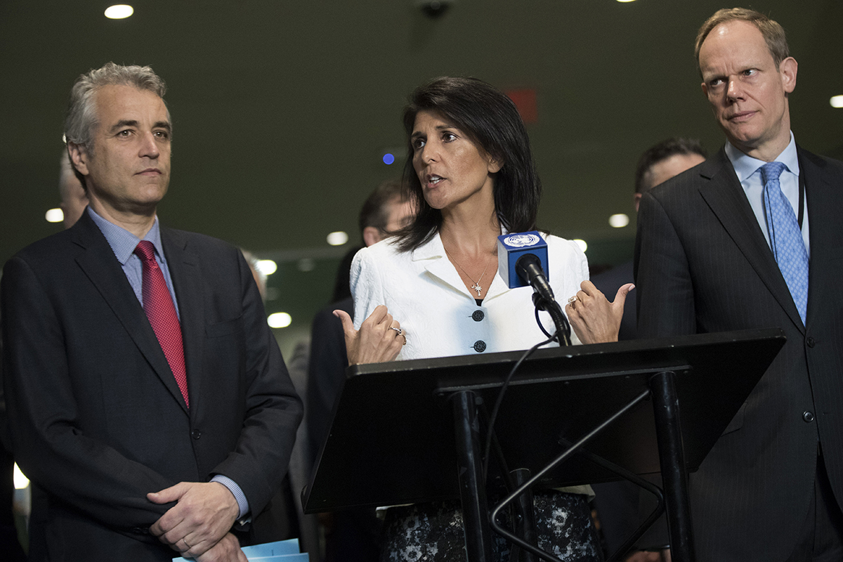 U.S. Ambassador to the United Nations Nikki Haley speaks at UN headquarters March 27 to explain why the United States isn’t participating in negotiations on a nuclear weapons prohibition treaty. In a show of support, she was flanked by French Deputy Permanent Representative to the United Nations Alexis Lamek (L) and British Permanent Representative to the United Nations Matthew Rycroft (R), whose nuclear-armed countries also are not participating in the negotiations. (Photo credit: Drew Angerer/Getty Images)