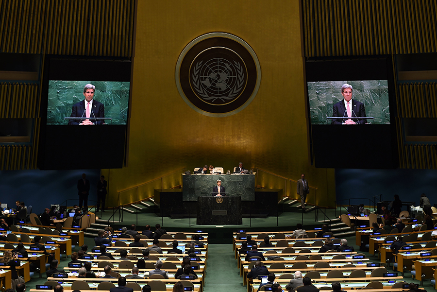 U.S. Secretary of State John Kerry addresses the 2015 Review Conference of the Parties to the Treaty on the Non-Proliferation of Nuclear Weapons (NPT) at the United Nations April 27, 2015 in New York. The parties failed to reach a consensus agreement on a substantive final declaration as a result of disagreements, including over establishment of a nuclear-weapon-free zone in the Middle East. The next formal review conferences is planned for 2020.(Photo credit: Timothy A. Clary /AFP/Getty Images)