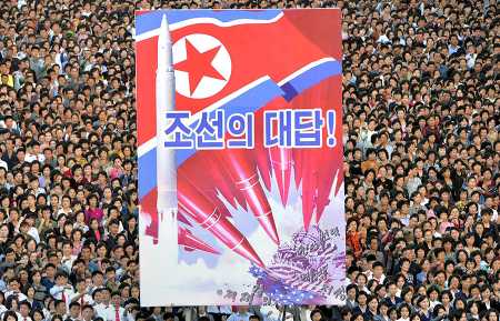 Tens of thousands of North Koreans participate in a state-organized, anti-U.S. rally in Pyongyang on Sept. 23.  (Photo credit: STR/AFP/Getty Images)