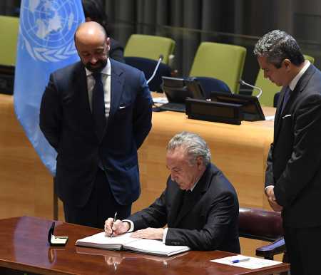 President Michel Temer of Brazil is the first to sign the Treaty on the Prohibition of Nuclear Weapons when it opened for signature Sept. 20 at the United Nations. (Photo credit: Don Emmert/AFP/Getty Images)