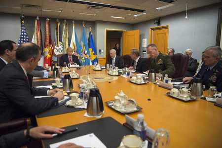 President Donald Trump speaks to members of the National Security Council before a meeting at the Pentagon on July 20. Trump subsequently denied an NBC News report that, during the meeting, he said he wanted to return U.S. nuclear forces to Cold War-era numbers.  (Photo credit: Sgt. Amber Smith/DVIDS)