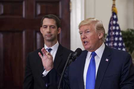 Sen. Tom Cotton (R-Ark.) with President Donald Trump at the White House on August 2. Cotton has been a leading voice in the Senate urging the president not to certify Iranian compliance with the nuclear accord, so that Congress can act.  (Photo credit: Zach Gibson - Pool/Getty Images)