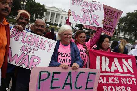 Activists participate in a protest in front of the White House October 12 denouncing President Trump's anticipated decision to decertify the Iran nuclear deal.  (Photo credit: Alex Wong/Getty Images)