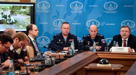 Mikhail Ulyanov, director of the Russian Foreign Ministry's Nonproliferation and Arms Control Department, and other officials hold a press conference in Moscow November 2 to dispute the report by UN investigators which blamed a sarin gas attack in Syria's Khan Sheikhoun on the Syrian government. (Photo credit: ALEXANDER NEMENOV/AFP/Getty Images)