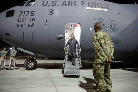 U.S. Secretary of State Rex Tillerson steps off a plane October 24 at the al-Udeid Air Base, Qatar, after flying earlier in the day to Iraq and Afghanistan. (Photo credit: ALEX BRANDON/AFP/Getty Images)