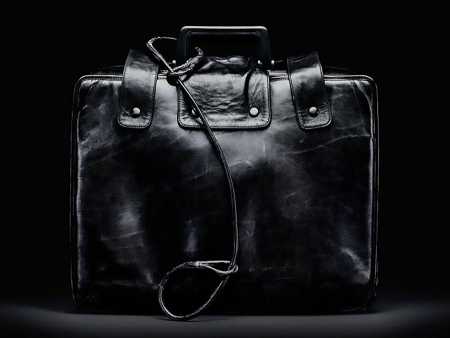 The so-called nuclear football, kept close to a president by a military aide, is a briefcase containing nuclear war plans and options (not communications gear) to enable a president to act in an emergency. This retired satchel was put on display at the Smithsonian National Museum of American History.  (Photo: Jamie Chung/Smithsonian Institute)