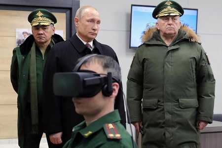 Russian President Vladimir Putin, accompanied by Defense Minister Sergei Shoigu, visits the Peter the Great Strategic Missile Forces Academy near Moscow on December 22, 2017. Russia denies the U.S. claim that it is violating the 1987 Intermediate-Range Nuclear Forces (INF) Treaty. (Photo: MIKHAIL KLIMENTYEV/AFP/Getty Images)