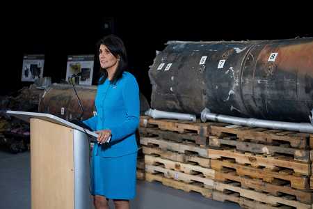 With missile remains as a backdrop, U.S. Ambassador to the United Nations Nikki Haley accuses Iran of violating Security Council Resolution 2231 by providing the Houthi rebels in Yemen with arms. She spoke at Joint Base Anacostia near Washington on December 14, 2017. (Photo: JIM WATSON/AFP/Getty Images)