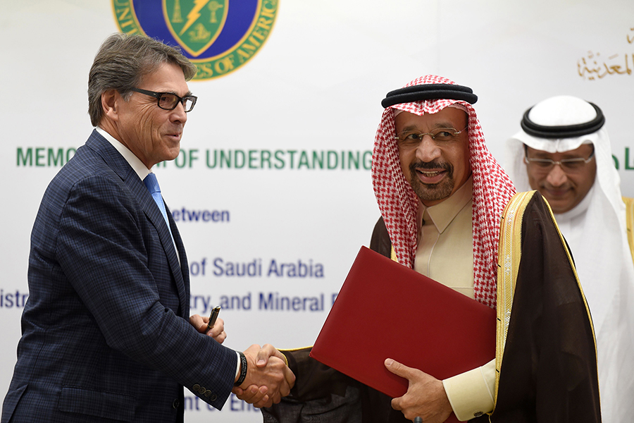 U.S. Energy Secretary Rick Perry (L) and Saudi Energy Minister Khalid al-Falih (R) shake hands after a signing ceremony of a memorandum of understanding on carbon management, on December 4, 2017 in Riyadh. (Photo: FAYEZ NURELDINE/AFP/Getty Images)