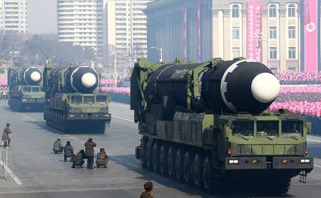 This photo, released on February 9 by North Korea's official Korean Central News Agency, shows Hwasong-15 intercontinental-range ballistic missiles during a military parade in Pyongyang. Analysts believe the missile is capable of reaching much or all of the continental United States, depending on the weight of its payload. (Photo: KCNA VIA KNS/AFP/Getty Images)