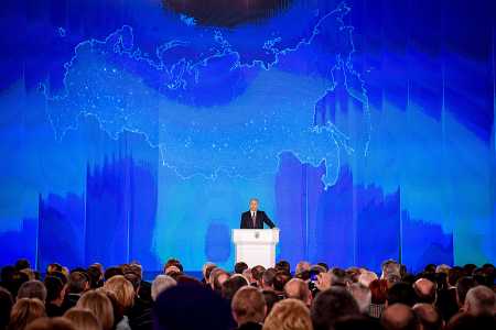 Russian President Vladimir Putin delivers an annual address March 1 to the Russian Federal Assembly at Moscow's Manezh Central Exhibition Hall. (Photo: YURI KADOBNOV/AFP/Getty Images)