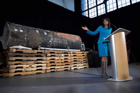 U.S. Ambassador to the United Nations Nikki Haley displays remains of an Iranian-made ballistic missile fired against Saudi Arabia by Houthi rebels in Yemen. Speaking December 14, 2017 in Washington, she said Iran violated UN Security Council Resolution 2231 by providing such missiles to the Houthis.  (Photo: JIM WATSON/AFP/Getty Images)