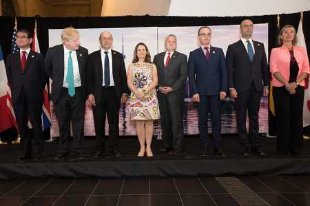 G-7 “family photo” taken at a reception at the Royal Ontario Museum in Toronto April 22. They are (from left): Japanese Foreign Minister Taro Kono, British Foreign Secretary Boris Johnson, French Foreign Affairs Minister Jean-Yves Le Drian, Canadian Minister of Foreign Affairs Chrystia Freeland, U.S. Deputy Secretary of State John Sullivan, German Foreign Minister Heiko Maas, Italian Minister of Foreign Affairs Angelino Alfano, and European Union foreign policy chief Federica Mogherini. (Photo: LARS HAGBERG/AFP/Getty Images)