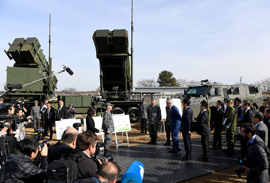Visiting Australian Prime Minister Malcolm Turnbull and Japanese Prime Minister Shinzo Abe listen to a briefing on the Patriot Advanced Capability-3 (PAC-3) surface-to-air missile system while visiting the Japan Ground Self-Defense Forces' Camp Narashino on January 18. (Photo: Toshifumi Kitamura/AFP/Getty Images)