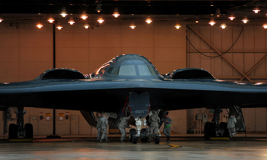 U.S. Air Force maintenance technicians assigned to the 509th Aircraft Maintenance Squadron work on a B-2 stealth bomber at Whiteman Air Force Base, Mo. on March 19, 2011. The unit maintains aircraft tasked with strategic nuclear deterrence and global strike operations. Photo credit: Kenny Holston/U.S. Air Force
