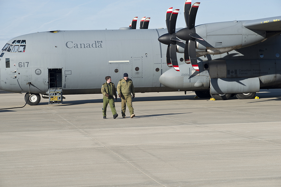 Royal Canadian Air Force members prepare their CC-130J aircraft for an Open Skies Treaty training flight February 2 at Rosecrans Memorial Airport, St. Joseph, Mo. Personnel from the United States, Canada, United Kingdom, France and the Czech Republic participated in the exercise. (Photo: John Hillier/U.S. Air National Guard/DVIDS)