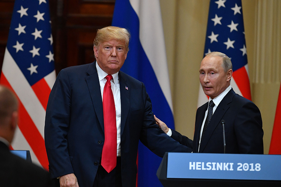 U.S. President Donald Trump and Russian President Vladimir Putin conclude a joint press conference following their meeting at the Presidential Palace in Helsinki on July 16. (Photo: Yuri Kadobnov/AFP/Getty Images)