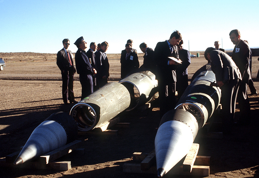 Soviet inspectors and their U.S. escorts stand among Pershing II missiles dismantled in accordance with the Intermediate-Range Nuclear Forces (INF) Treaty in January 1989. (Photo: U.S. Defense Department)