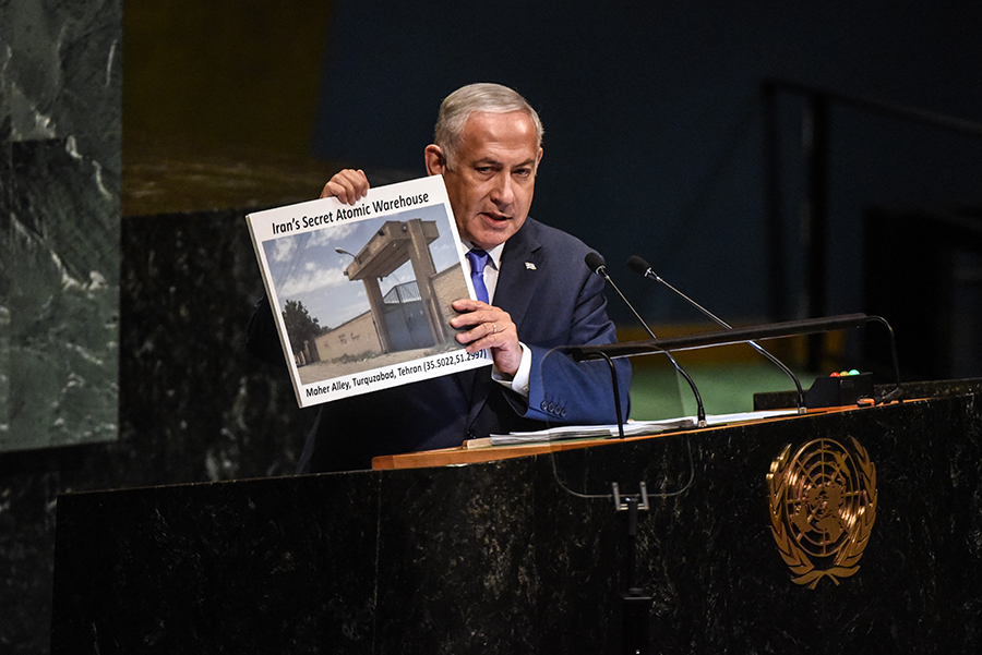 Israeli Prime Minister Benjamin Netanyahu, addressing the United Nations, uses a visual aid to highlight his allegations about a “secret atomic warehouse” in Tehran. His comments were misleading, according to two U.S. intelligence officials cited by Reuters. (Photo: Stephanie Keith/Getty Images)
