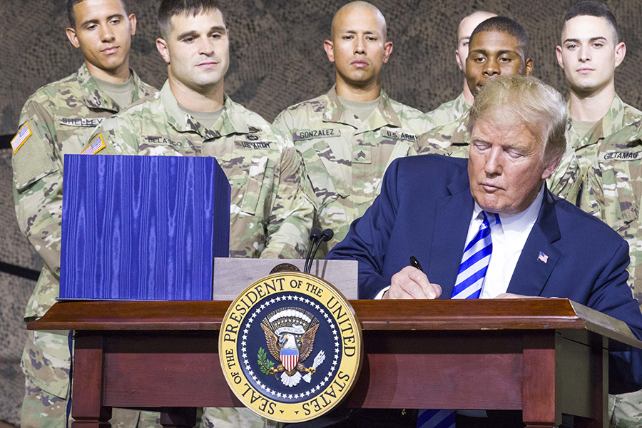 President Donald Trump signs the National Defense Authorization Act of 2019 at Fort Drum, New York, on August 13. Rep. Adam Smith says the House Armed Services Committee, under Democratic control, will undertake renewed scrutiny of key defense programs, including nuclear-weapons procurement and policies.  (Photo: Sgt. Thomas Scaggs/U.S. Army)