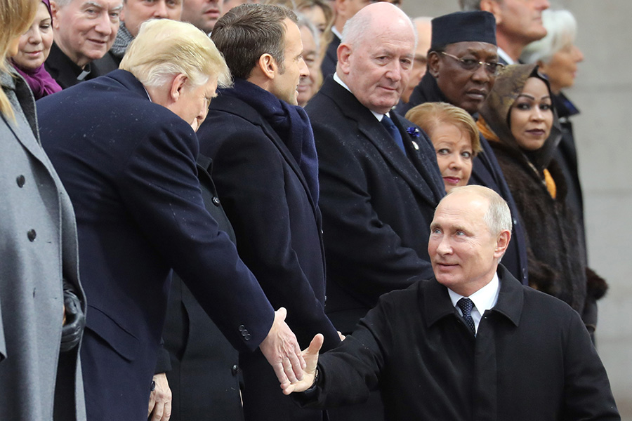 U.S. President Donald Trump shakes hands with Russian President Vladimir Putin as they gather with other leaders for a November 11 ceremony in Paris marking the 100th anniversary of the 1918 armistice that ended World War I.   (Photo: Ludovic Marin/AFP/Getty Images)
