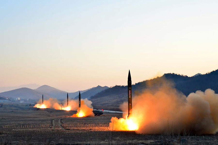 North Korea simultaneously launches four ballistic missiles during a military drill March 6, 2017 at an undisclosed location.  (Photo: STR/AFP/Getty Images)