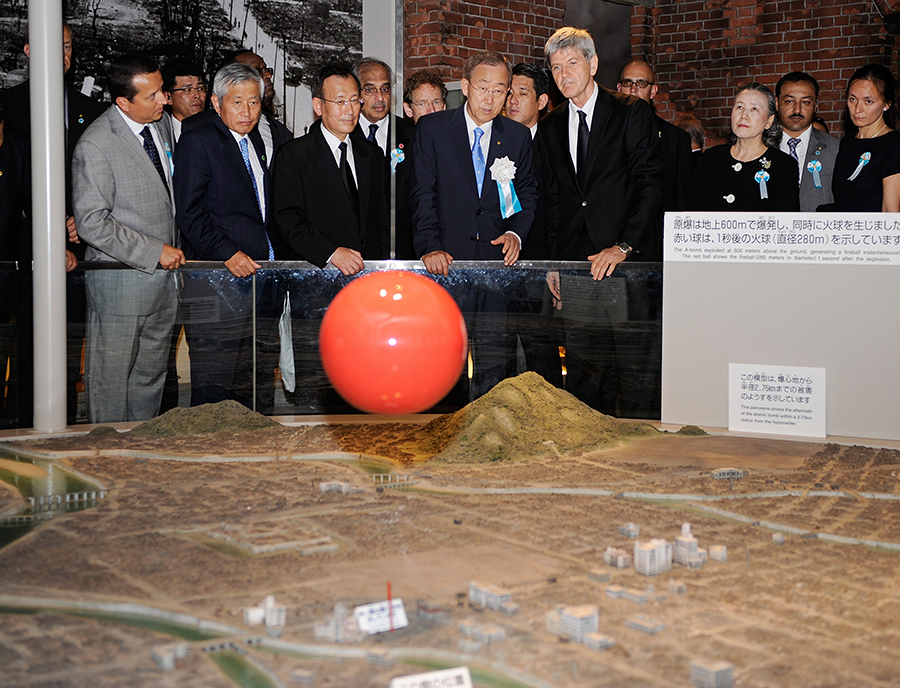 Then-UN Secretary-General Ban Ki-moon (C), a prominent advocate for disarmament, looks at a model of the 1945 nuclear bombing in Hiroshima at the Peace Memorial Museum on August 6, 2010. Ban was the first UN secretary-general to attend a Peace Memorial Ceremony on the anniversary of the attack on Hiroshima. His successor, António Guterres, became the first UN secretary-general to an annual commemoration of the attack on Nagasaki, held August 9, 2018. (Photo: Toru Yamanaka/AFP/Getty Images)