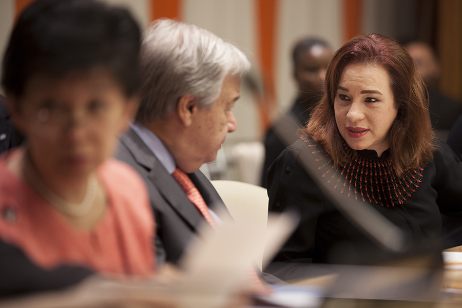 UN Secretary-General António Guterres speaks with María Fernanda Espinosa Garcés, president of the 73rd General Assembly session, during the high-level plenary meeting to commemorate and promote the International Day for the Total Elimination of Nuclear Weapons on September 26, 2018. At left is Izumi Nakamitsu, UN undersecretary-general and high representative for disarmament affairs. (Photo: Ariana Lindquist/UN)