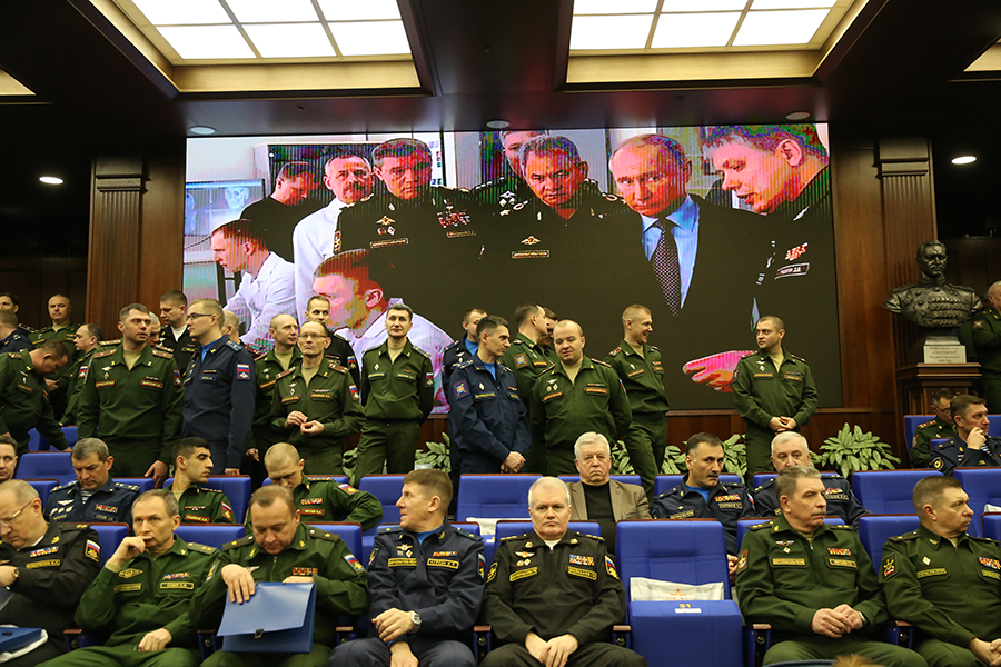 Russian President Vladimir Putin is seen on the screen during an annual meeting with high-ranking military officers on December 18, 2018 in Moscow. Putin told them that if the United States “breaks the [INF] treaty,” Russia will be “forced to take additional measures to strengthen [its] security.” (Photo: Mikhail Svetlov/Getty Images)