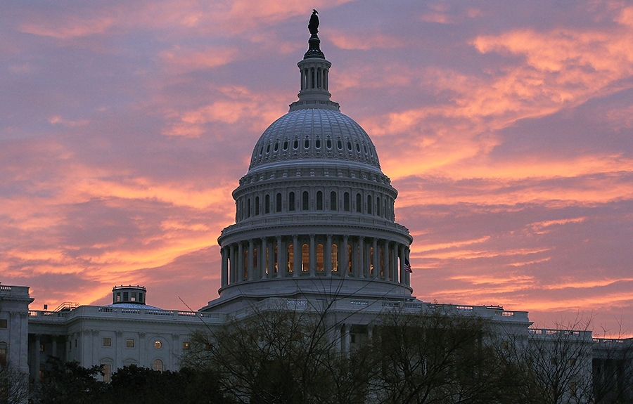 The sun rises behind the U.S. Capitol on December 17, 2010, when the full U.S. Senate debated its Resolution of Ratification for New START. (Photo: Mark Wilson/Getty Images)