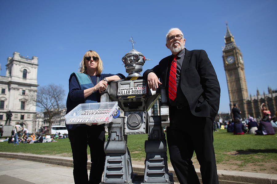Jody Williams (left), a Nobel Peace Laureate, and Noel Sharkey, the chair of the International Committee for Robot Arms Control, called for a ban on fully autonomous weapons in Parliament Square in London on April 23, 2013. The 'Campaign to Stop Killer Robots' is calling for a pre-emptive ban on lethal robot weapons that could attack targets without human intervention. (Photo: Oli Scarff/Getty Images)