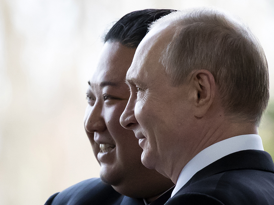 Russian President Vladimir Putin (right) greets North Korea leader Kim Jong Un during a portion of Kim's visit to Vladivostok on April 25. (Photo: Alexander Zemlianichenko/AFP/Getty Images)