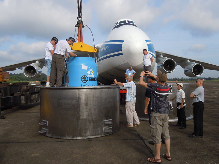 Workers load a cask of spent highly enriched uranium removed from a Vietnamese research reactor into a container bound for Russia. The Trump administration is seeking to reduce financial support for the Energy Department's nonproliferation efforts. (Photo: Sando Tozser/IAEA)