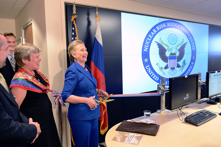 Secretary of State Hillary Clinton cuts the ceremonial ribbon at the opening of the updated U.S. Nuclear Risk Reduction Center at the State Department on Oct. 24, 2012. The center and its Russian counterpart are operational at all times and intended to reduce the risk of nuclear conflict. (Photo: State Department)