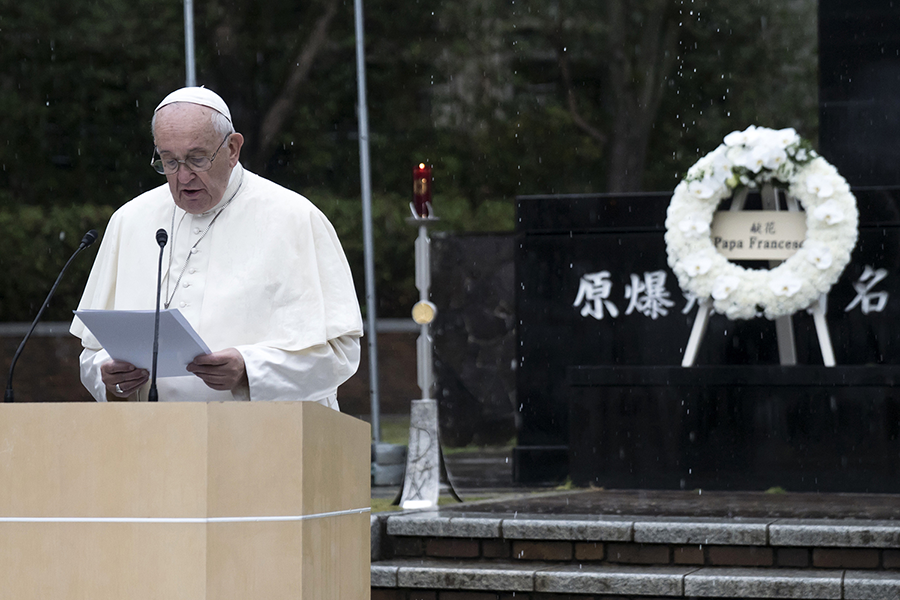 Pope Francis stands in front of the Memorial Cenotaph as he observes a minute of silence in memory of the victims of the Hiroshima atomic bomb during his visit to the Peace Memorial Park on November 24. (Photo: Carl Court/Getty Images)