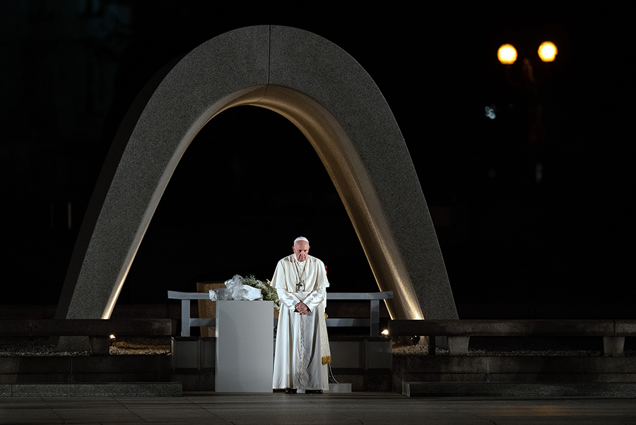 Pope Francis stands in front of the Memorial Cenotaph as he observes a minute of silence in memory of the victims of the Hiroshima atomic bomb during his visit to the Peace Memorial Park on November 24. (Photo: Carl Court/Getty Images)