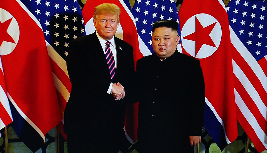 In more hopeful days, President Donald Trump and North Korean leader Kim Jong Un greet each other at their Hanoi summit in February 2019. Nearly one year later, their inflammatory rhetoric has resumed. (Photo: Vietnam News Agency/Getty Images)