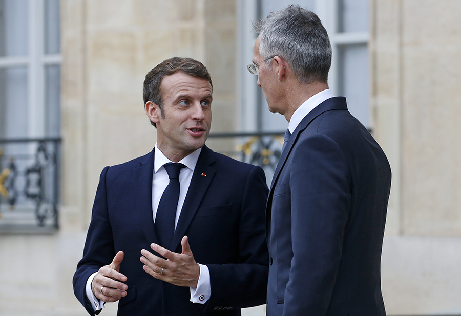 French President Emmanuel Macron (left) speaks with NATO Secretary General Jens Stoltenberg after their meeting in Paris in November 2019. Macron has expressed a desire for European nations to become more involved in nuclear arms control.  (Photo: Chesnot/Getty Images)