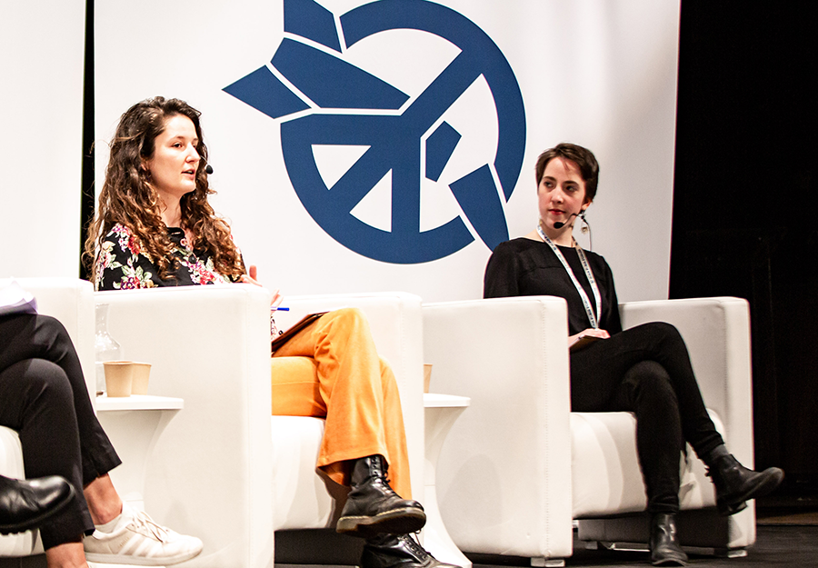 Chaja Merk of Extinction Rebellion (left) and Alicia Sanders-Zakre of the International Campaign to Abolish Nuclear Weapons (ICAN) speak at ICAN's Campaign Forum in Paris on Feb. 15. ICAN promotes the 2017 Treaty on the Prohibition of Nuclear Weapons that has been signed by 81 states so far, despite U.S. opposition. (Photo: Joe Jukes/ICAN)