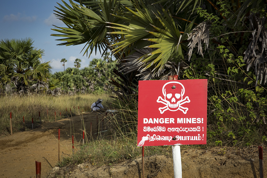 A de-miner works to clear mines in Muhamalai, Sri Lanka, in March 2019. (Photo: Allison Joyce/Getty Images)
