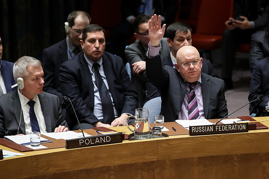 Russian Ambassador to the United Nations Vasily Nebenzya votes to veto a U.S. draft resolution in the UN Security Council on April 10, 2018. The draft resolution sought to find blame for the chemical weapons attack in Douma, Syria earlier that month. (Photo: Drew Angerer/Getty Images)