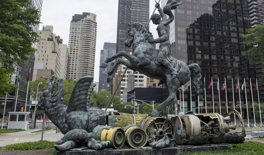 The sculpture “Good Defeats Evil” on the grounds of the United Nations headquarters depicts St. George slaying the dragon. (UN photo by Rick Bajornas)